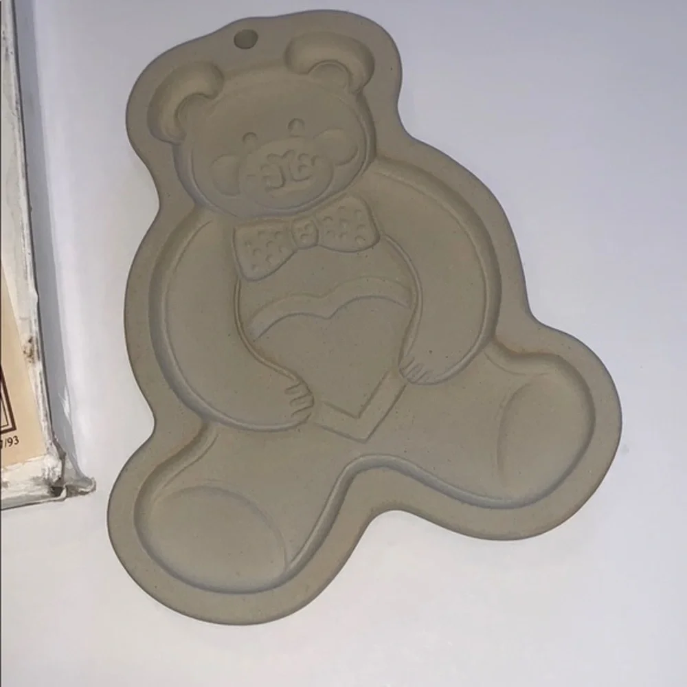 The Pampered Chef clay cookie mold
